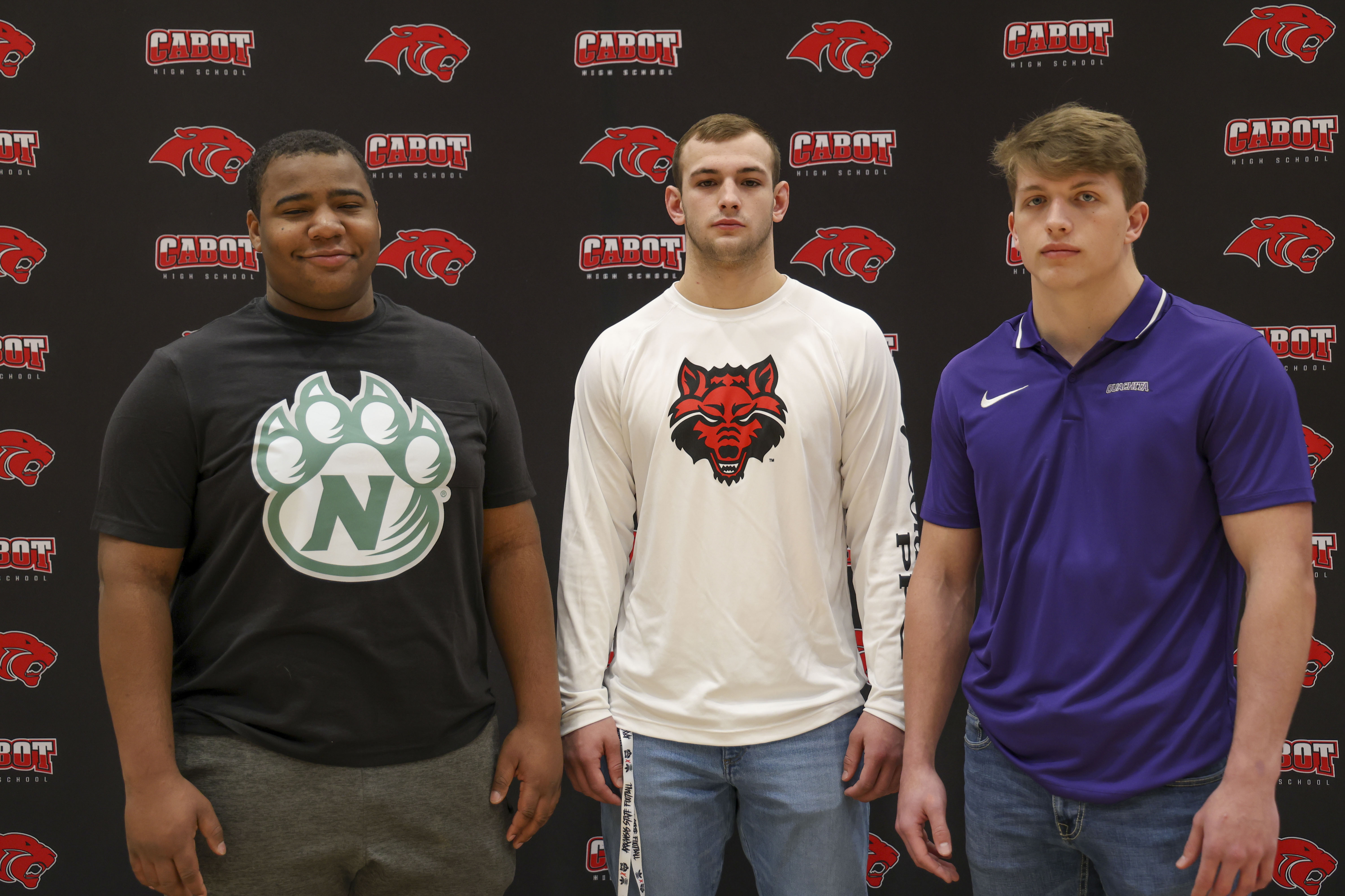 Logan, DK, and Eason - football college signers